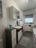 Bad mit Dusche und Wanne