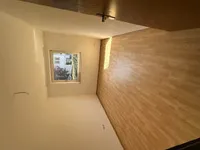 Wohnzimmer mit Balkon