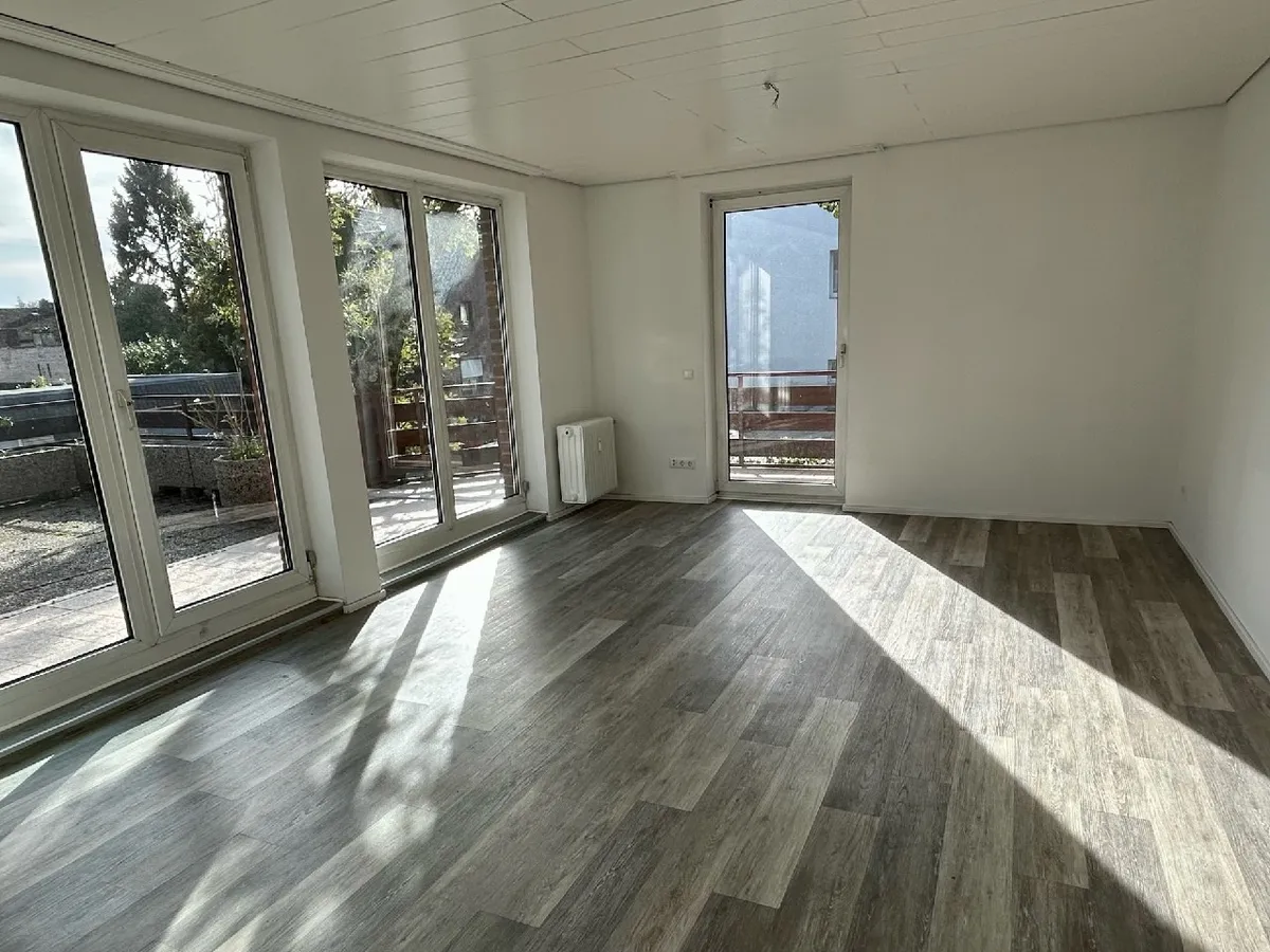 Wohnzimmer mit Ausgang zur Terrasse