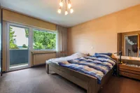 Schlafzimmer mit Balkon