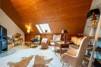 Dachstudio mit Kaminofen