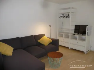 1 Zi. Whg., möbliert, 1. OG im Mehrfamilienhaus, mit Balkon.