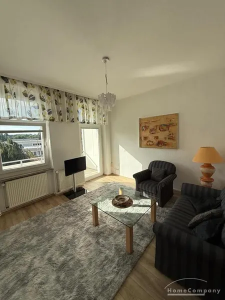 Schöne, gemütliche 2 Zi.-Wohnung, möbliert, mit Balkon Richtung Westen, PKW-Stellplatz.