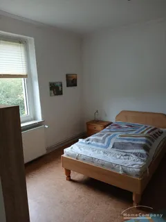 Schöne 3 Zi.-Wohnung im EG eines 4-Familien-Hauses. Garten zur Mitbenutzung.  Nähe Bahnhof.