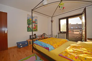 Schlafzimmer mit Balkon