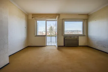 1. OG Wohnzimmer mit Balkon