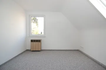 Schlafzimmer mit Ofen