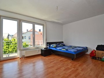 Zimmer mit Balkon