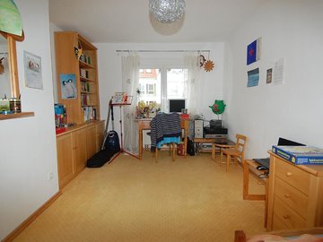 Kinderzimmer mit Teppich