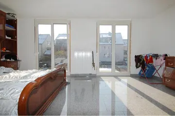 Schlafzimmer mit Balkon