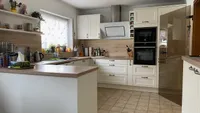Die Küche mit hochwertigen Einbauten...