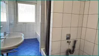 Hell verflietes Fenster-Bad mit Dusche in der OG-Wohnung