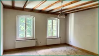 Großes Schlafzimmer in der Dachgeschosswohnung