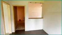 Esszimmer mit Durchreiche zum Wohnzimmer