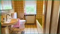 Badezimmer im Erdgeschoss mit...