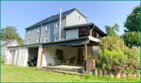 Rückseite des Wohnhauses mit Gartenterrasse