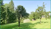 Überdachter Freisitz im Garten mit...