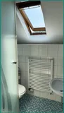 Hinteres Badezimmer mit Echtglasdusche