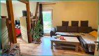 Wohnzimmer der Dachgeschosswohnung...