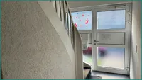 Treppenhaus mit Eingangsbereich im Haus 2