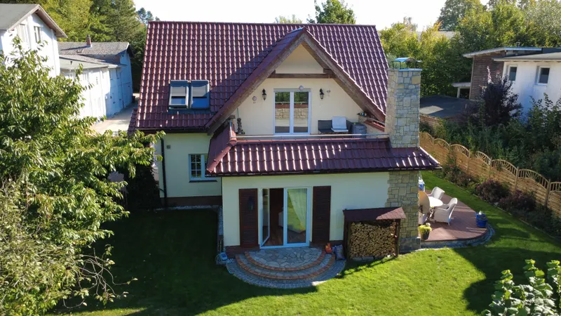 Besonderes Einfamilienhaus mit Traumgarten und Dachterrasse – Exklusiv & ruhig