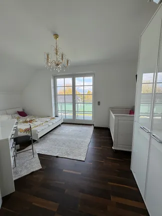 Schlafzimmer mit Balkon