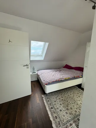 Zimmer im Spitzboden