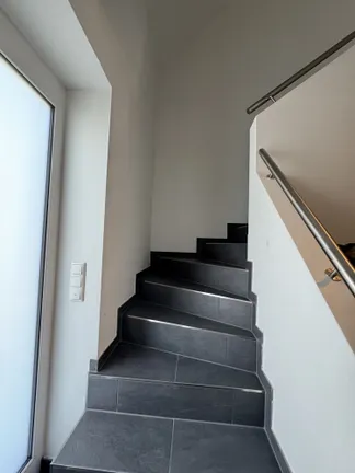 Treppe ins Obergeschoss