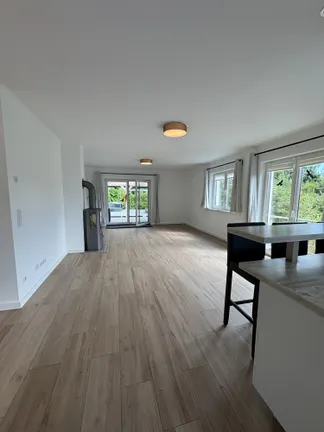 Wohnzimmer mit Kaminofen oben
