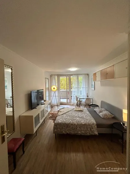 Hübsches, modernes 1-Zimmer-Apartment mit Balkon im berühmten Fuchsbau in Schwabing.