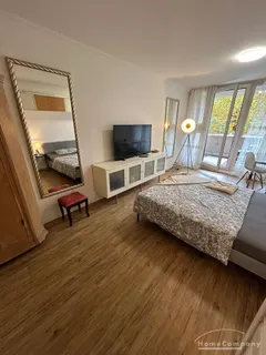 Hübsches, modernes 1-Zimmer-Apartment mit Balkon im berühmten Fuchsbau in Schwabing.