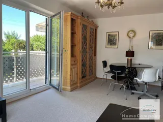 Lichtdurchflutete, freundlich möblierte 3-Zimmer-Wohnung mit Dachterrasse