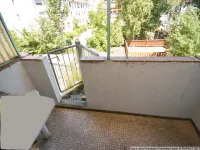 Balkon mit Wendeltreppe in den Garten