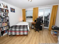 Schlafzimmer mit Balkonzugang