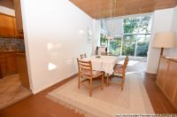 Offener Wohnbereich mit Küche u Wintergarten