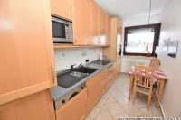 Küche mit Sitzmöglichkeit