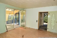 Wohnraum mit Windfang und Wintergarten