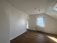 Wohnzimmer mit Zugang zur Küche