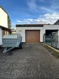 Garage und Außenstellplatz