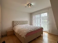 Schlafzimmer mit Balkon
