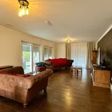 Wohnzimmer mit Wintergarten