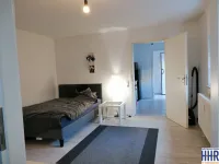 Wohnraum mit Zugang zur Küche